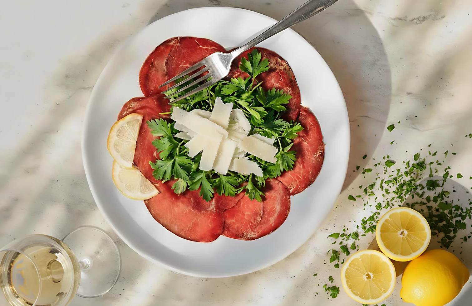 Carpaccio with rocket and cheese shavings